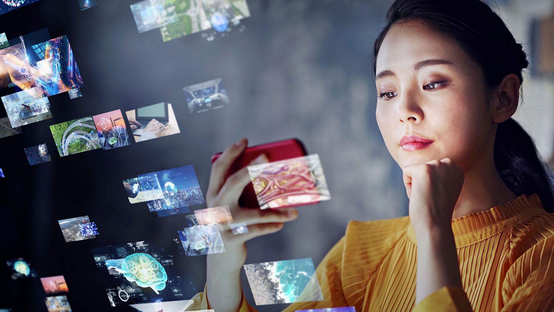 A woman watching videos on her smartphone